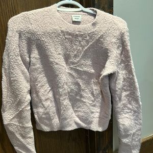 Dusty pink in colour, fuzzy cropped sweater.